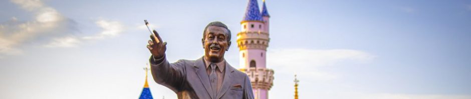 A Walt Disney statue holding a cigarette